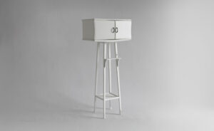Alto Fragile 1950s wooden night table transformed into a small installation handmade in Italy by Manoteca.