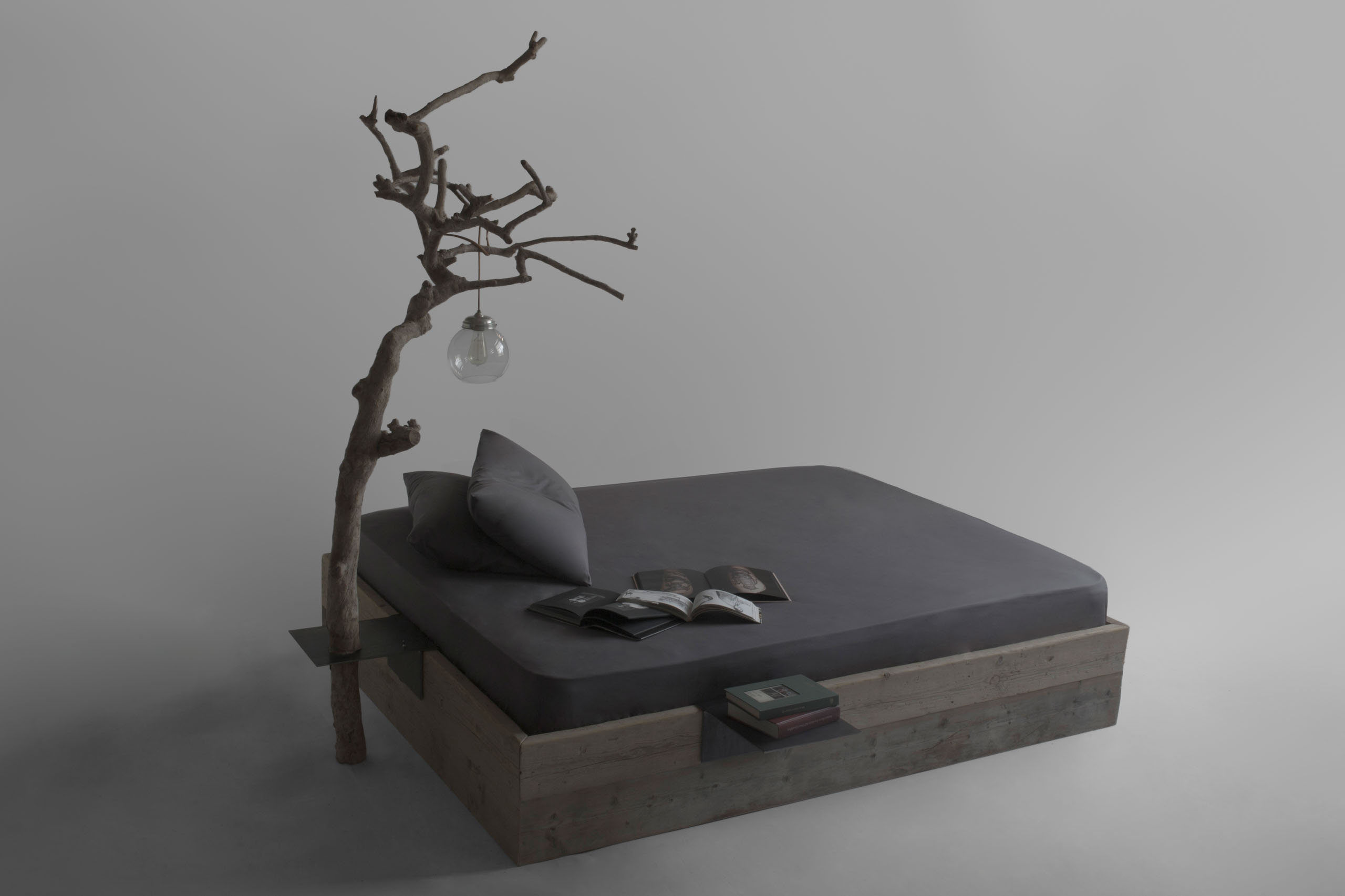 Haiku Bed with sliding wooden element moved toward the back