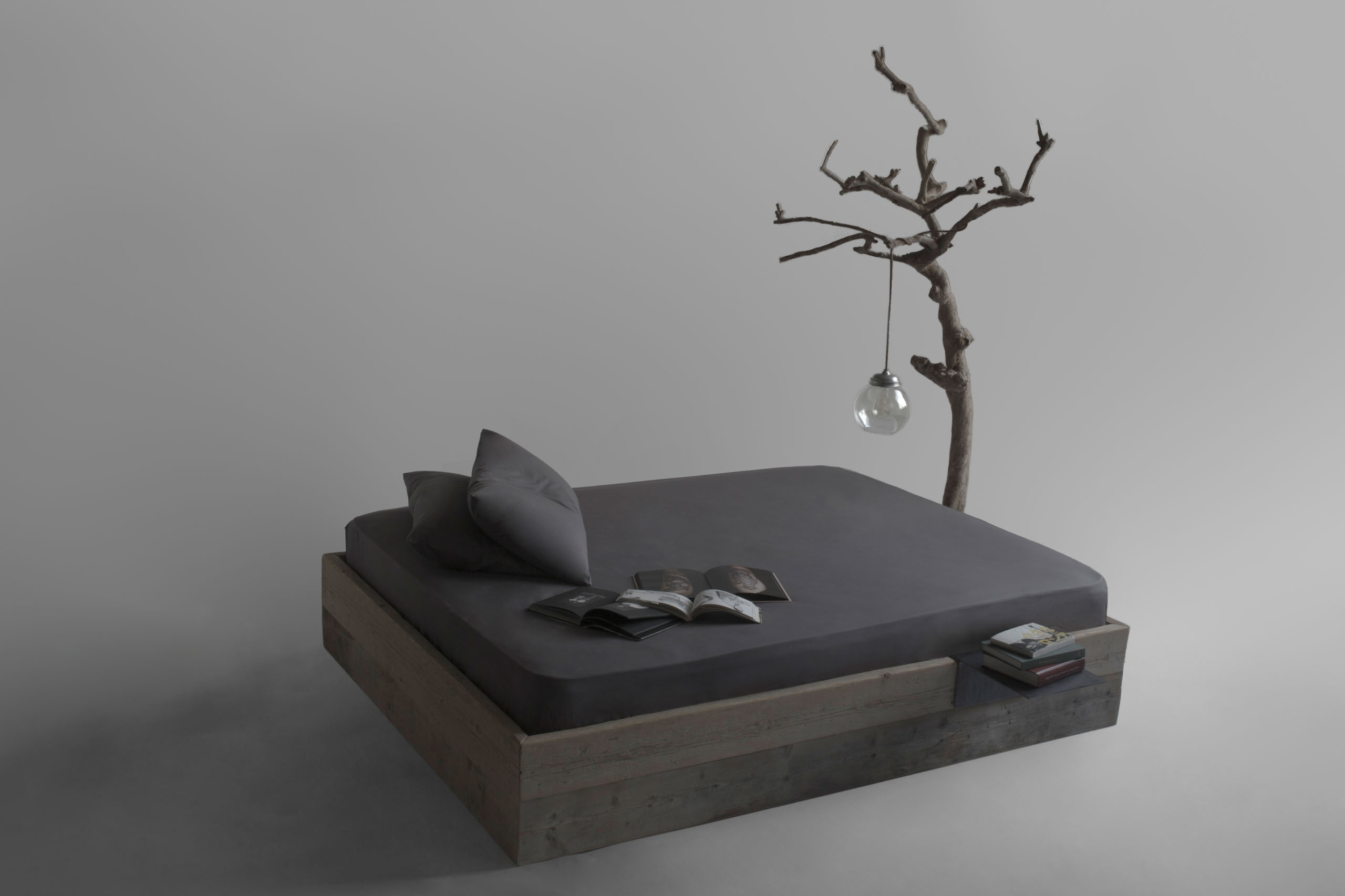 Haiku Bed with sliding wooden panel placed at the foot