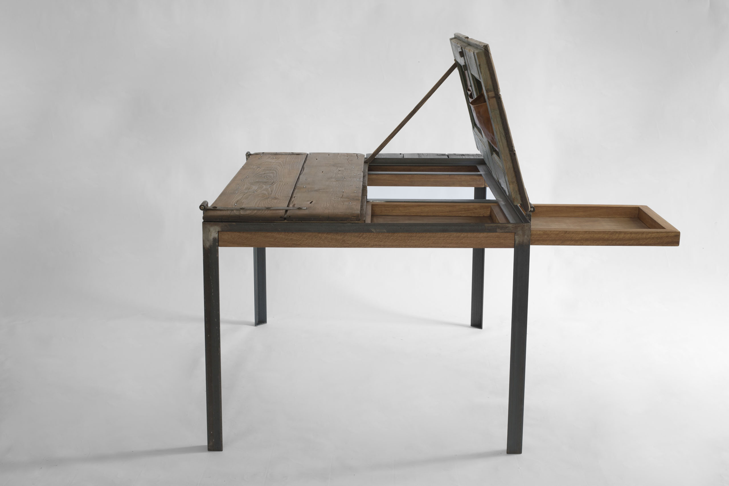Indoor K table with right side drawer extended, revealing dual lateral storage