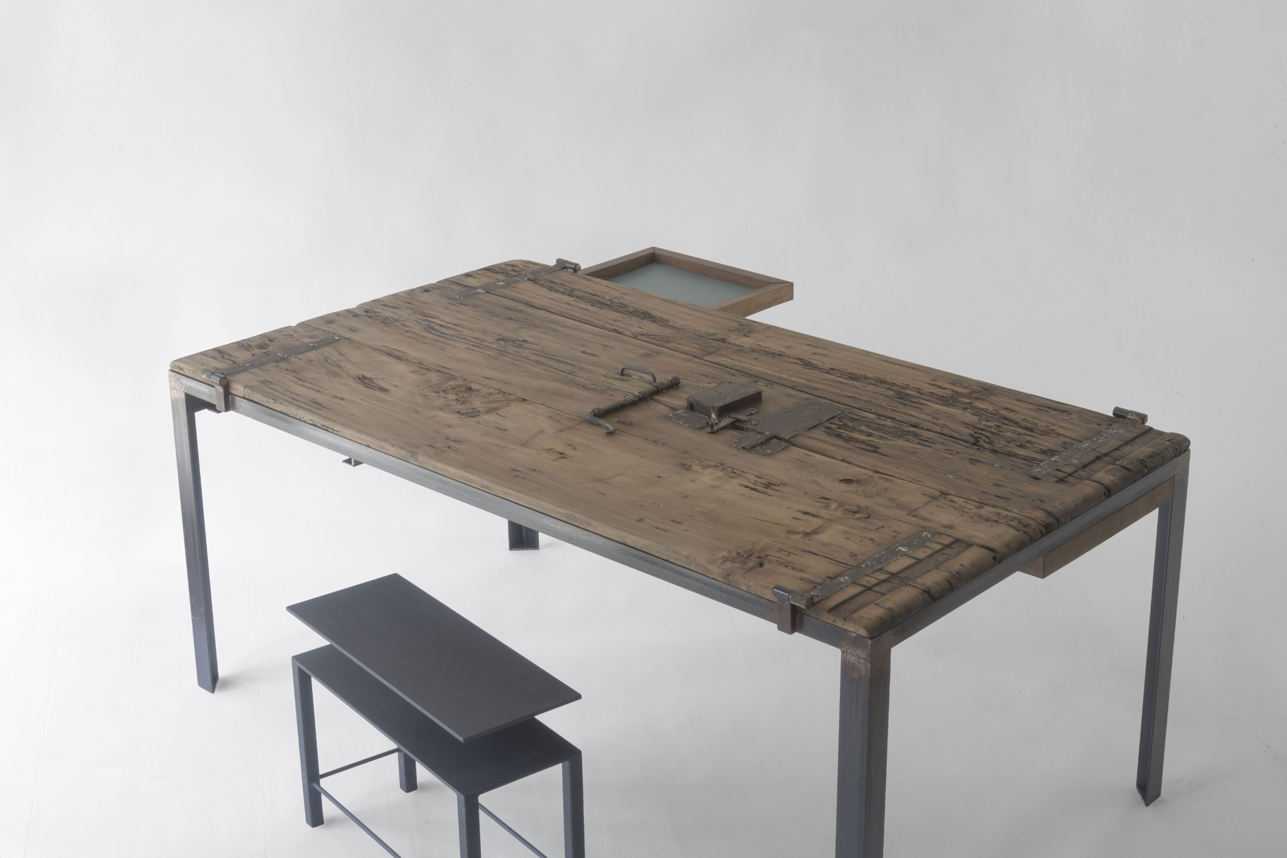Indoor 10 table fully closed with reclaimed wood doors forming a flat surface