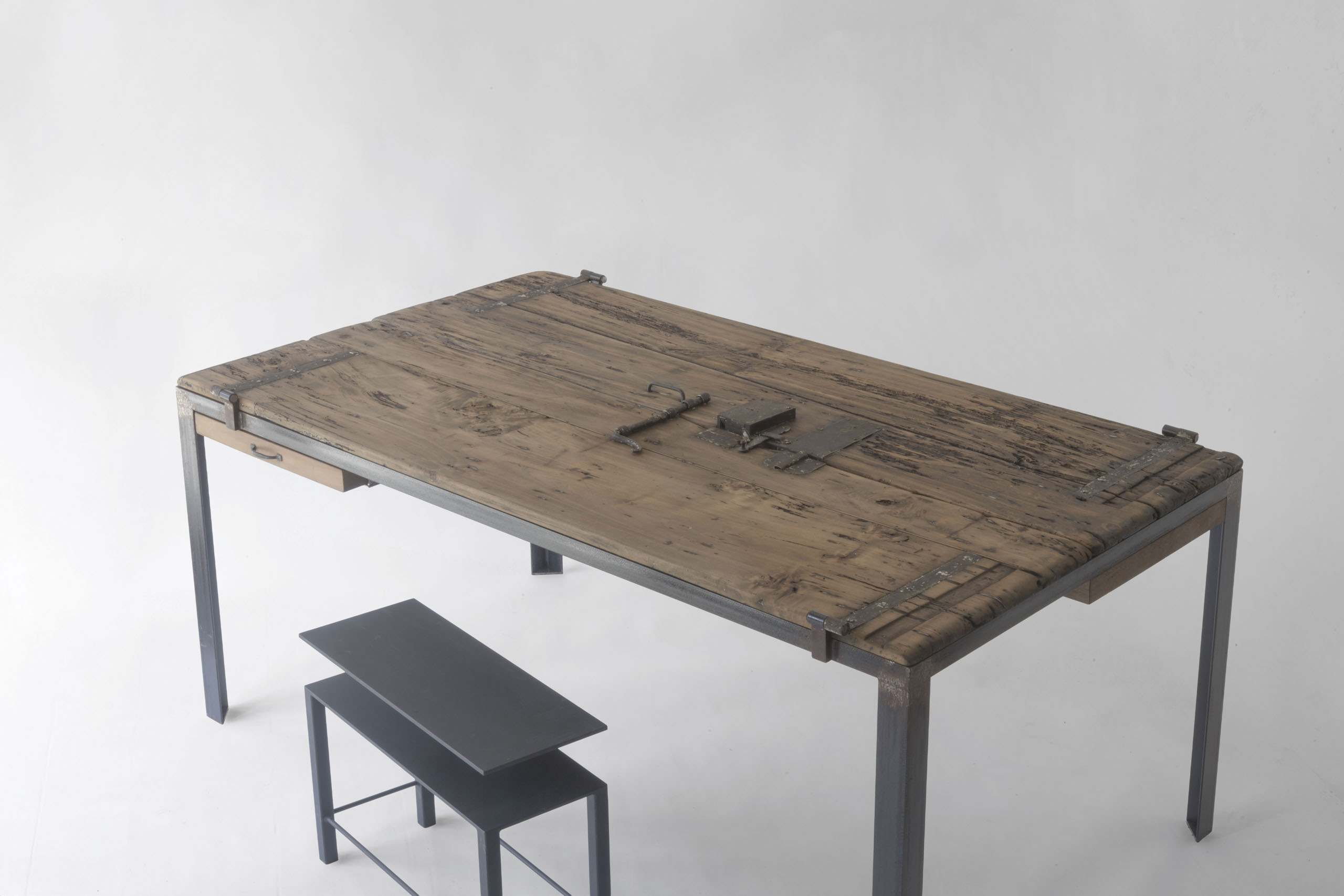 Indoor 10 table nearly closed with reclaimed wood panels aligned