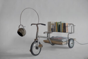 Riksha 1960s iron rickshaw transformed into a mobile reading lamp and book carrier