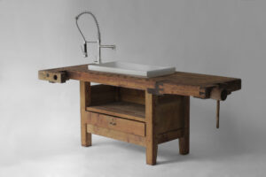 frontal view of olmo uk elm kitchen table with ceramic sink